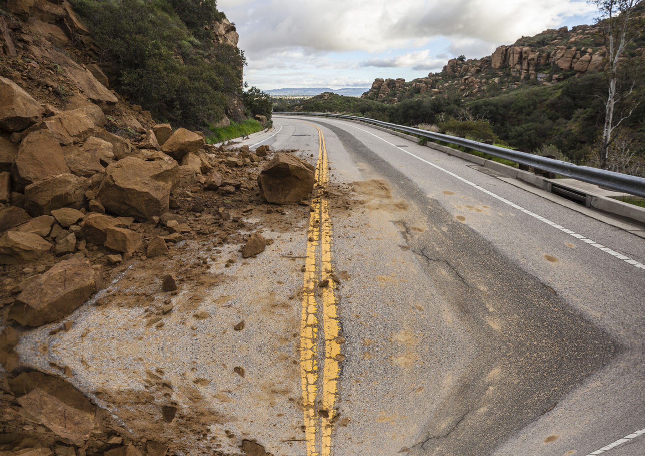 Storm related landslide blocking Santa Susana Pass Road in Los Angeles, California.