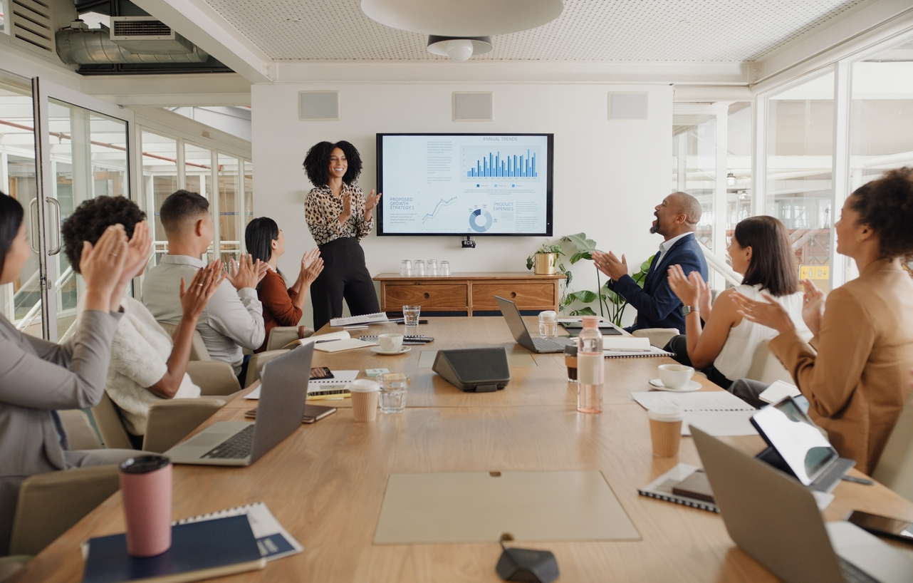 Business people, applause and presentation at conference with team in meeting, motivation or leadership at office. Group of happy employees clapping for proposal, collaboration or success at workshop